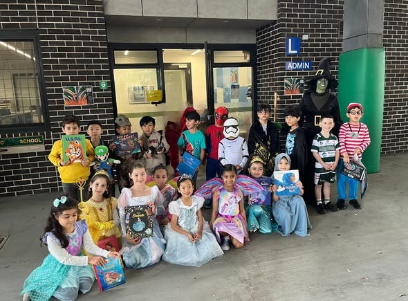 A class of students dressed in vibrant character costumes to celebrate Book Week at the Book Parade
